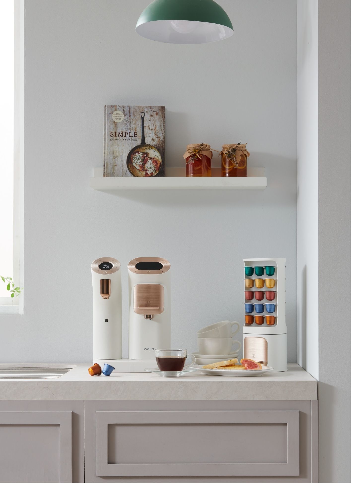 Wells The One and Home Café capsule brewer on a kitchen counter